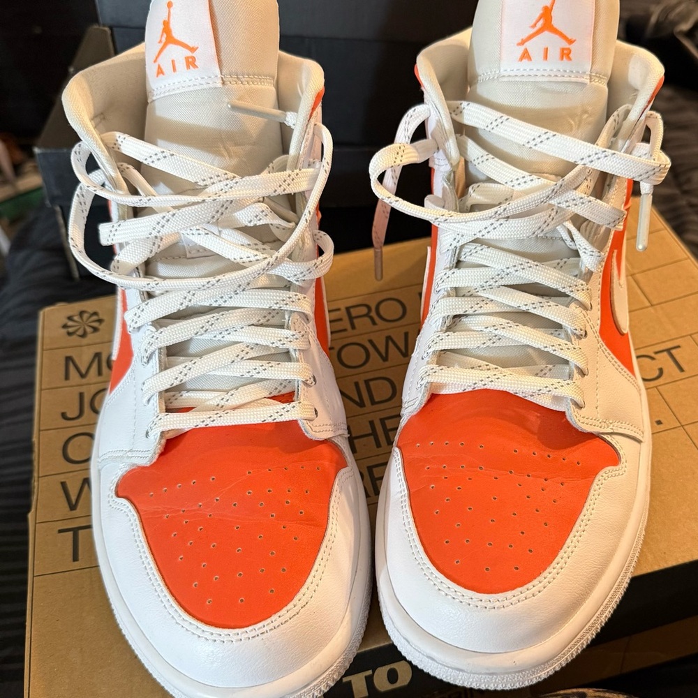 Women- White and Orange Jordan ones high top